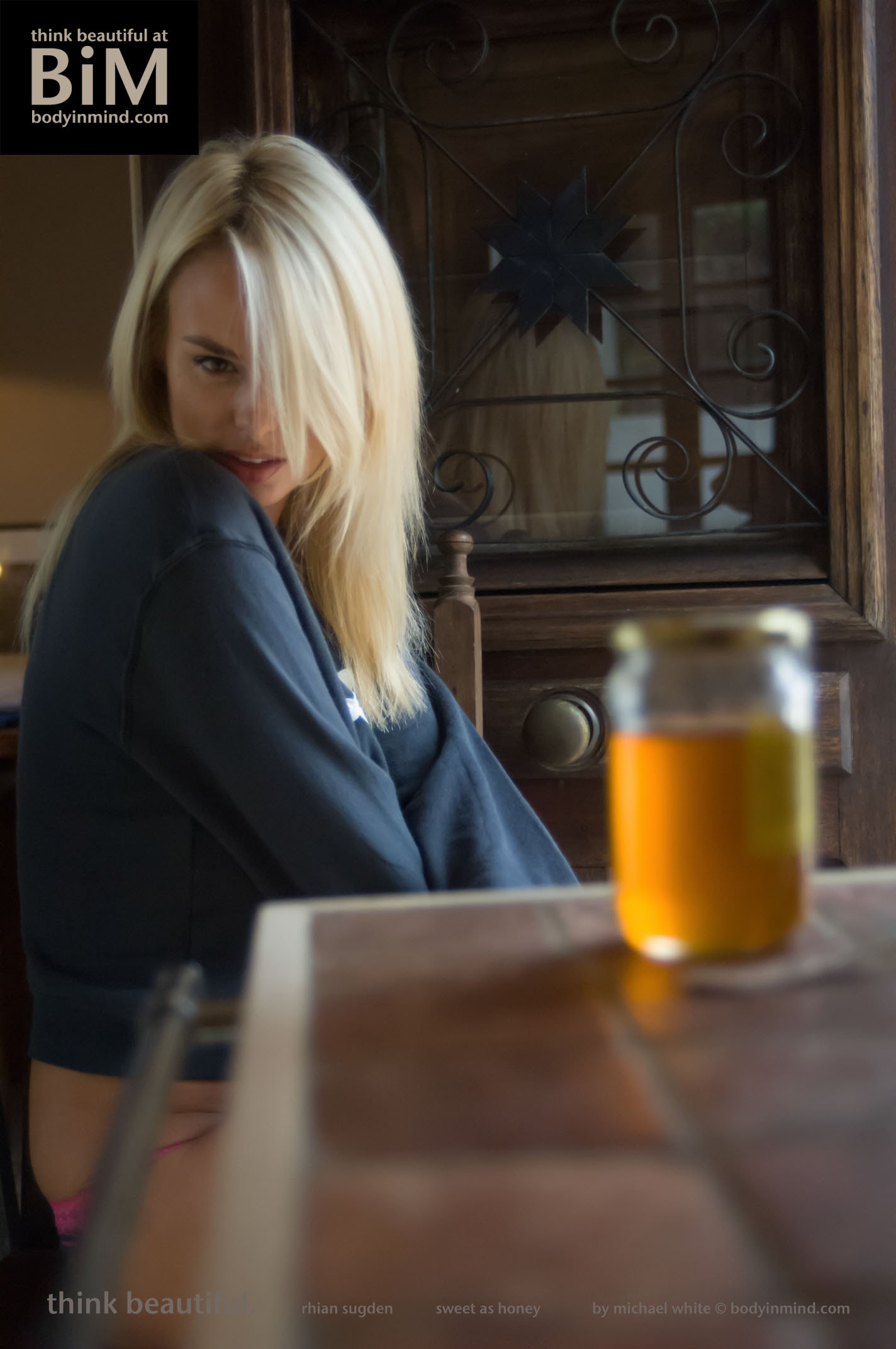 Rhian Sugden looks too sweet as she drops honey on her big boobs