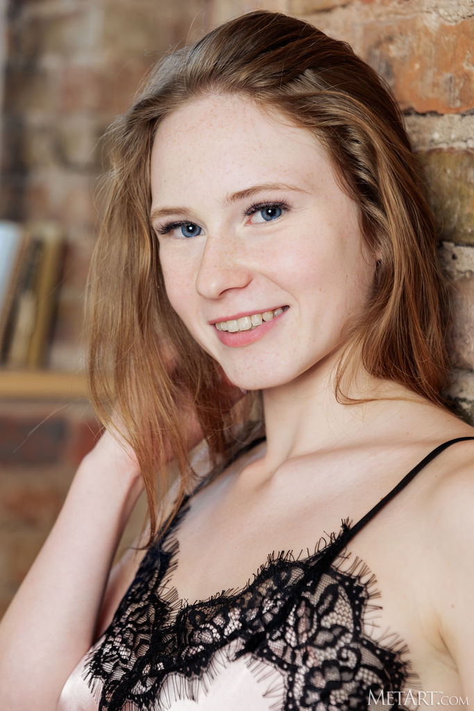 Zuzanna Wearing A Pink Silk Camisole And Matching Tap Pants
