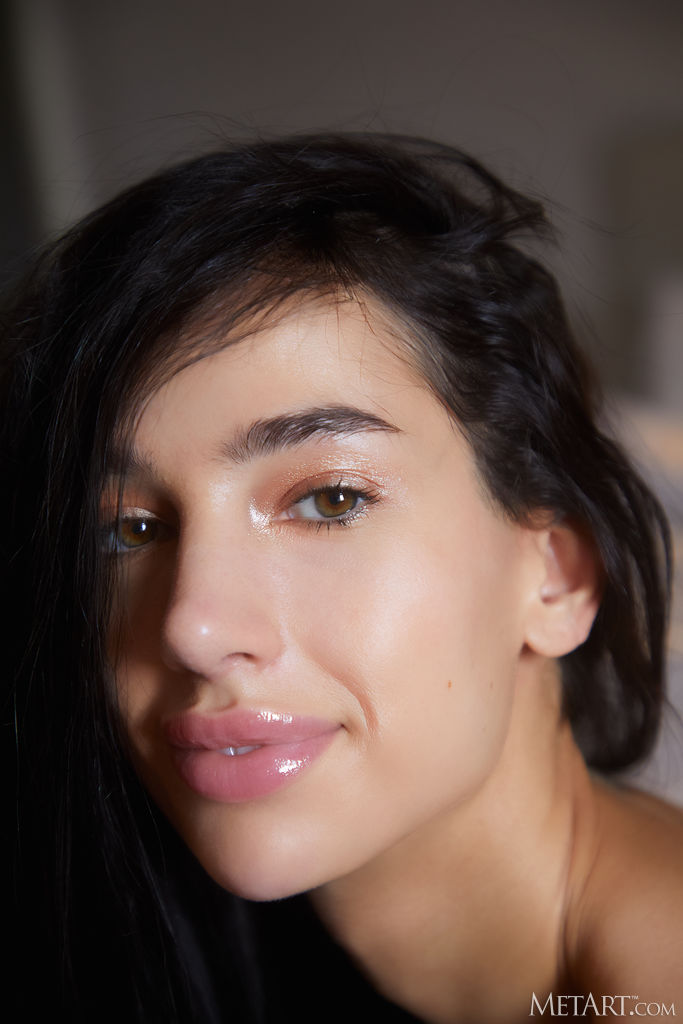 Kama Oxi With Silver Chains Of Her Sexy Lingerie Showcasing Her Slender Figure Alluringly