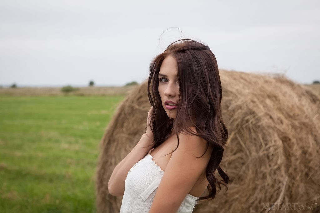 Niemira - Delightful brunette shows awesome body at filed by hayloft