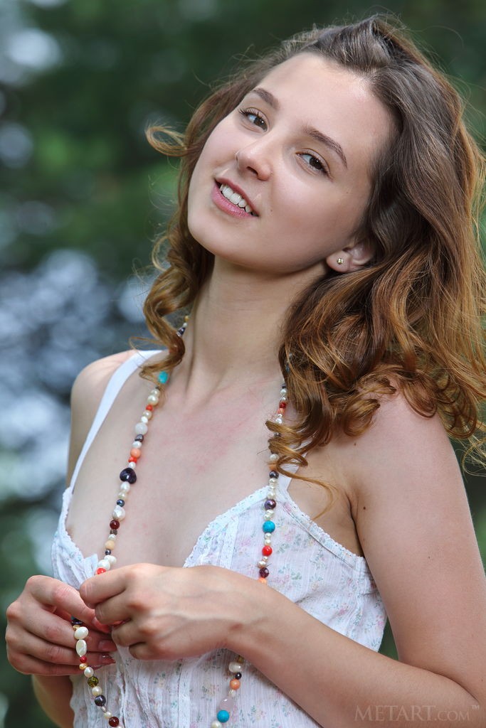 Ava - Cute teen babe getting naked on a picnic in the forest