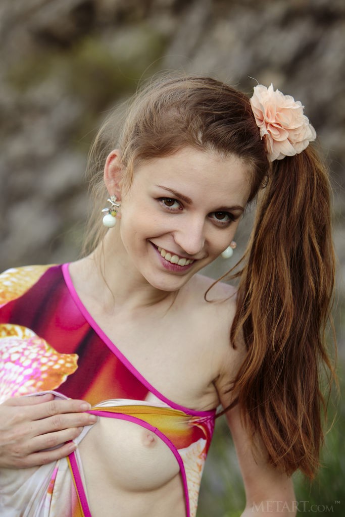 Sofi Shane - Mountain climbing red head teen striping on a mountain pass