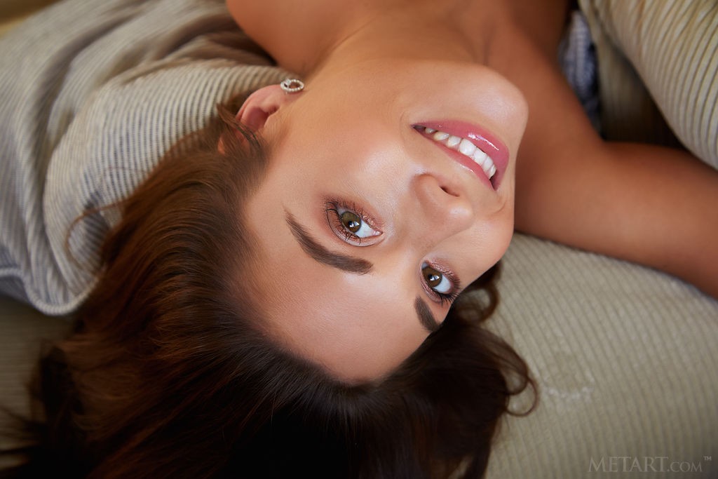 Sabrisse A - Flashing an amazing smile, she ends up naked on the couch