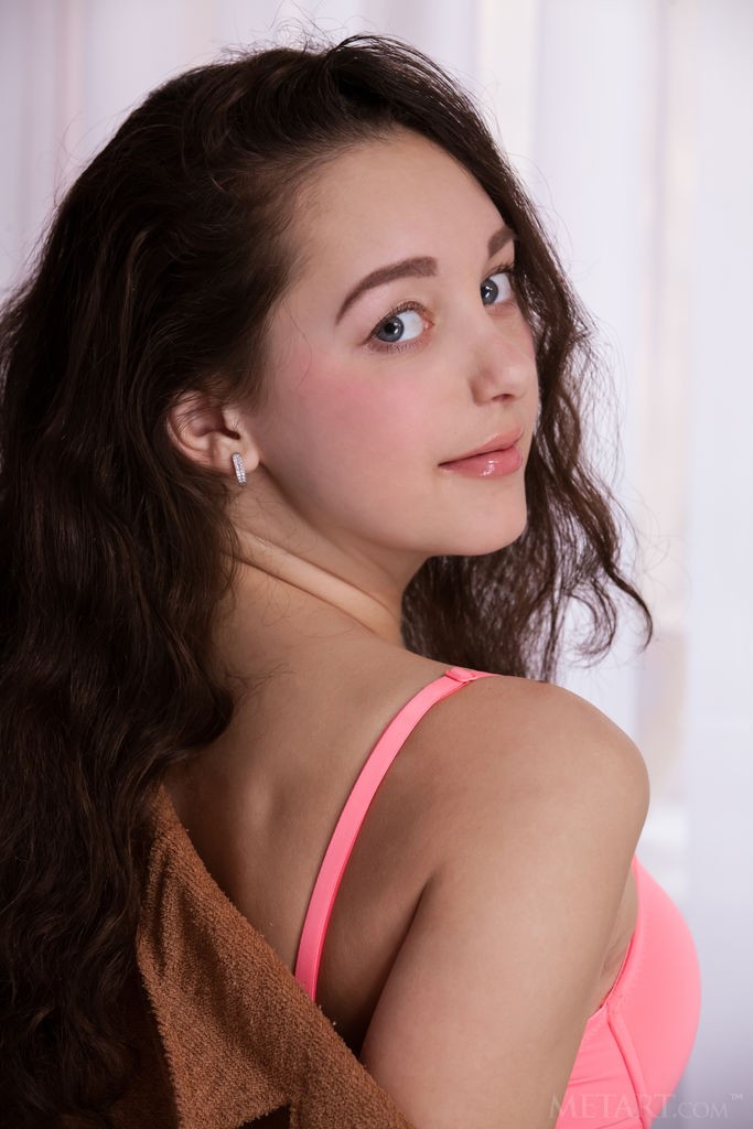Solange - Girl with pretty eyes and perky tits relaxes in her bed