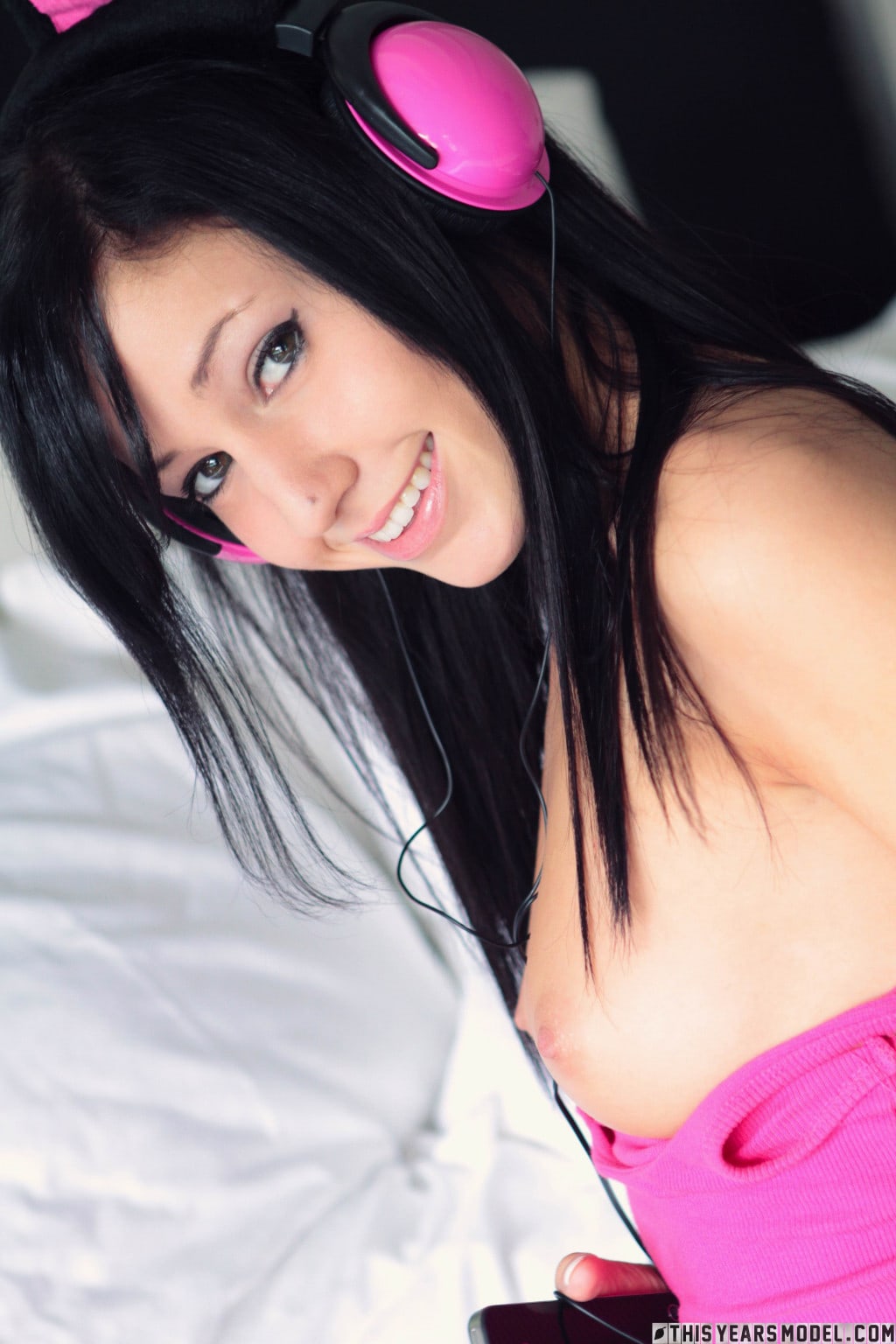 Gamer girl Catie Minx showing off her small tits and ass